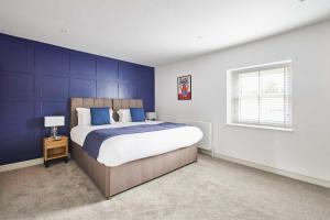 En eller flere senge i et værelse på Host & Stay - Damson Cottage