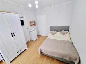Postel nebo postele na pokoji v ubytování Pokoje Basia