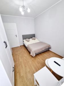Postel nebo postele na pokoji v ubytování Pokoje Basia