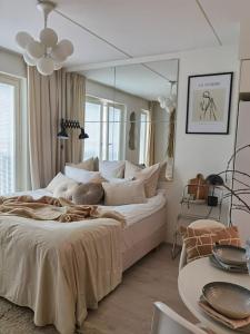 Postel nebo postele na pokoji v ubytování Studio Cityliving LUX - private, free parking