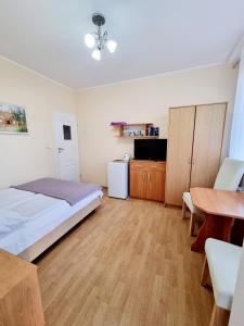 Postel nebo postele na pokoji v ubytování Pokoje Basia