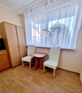 TV a/nebo společenská místnost v ubytování Pokoje Basia