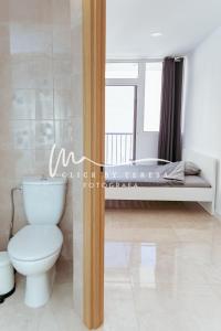 Katil atau katil-katil dalam bilik di Few steps from the beach hostel in Los Cristianos