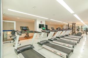 Fitness centrum a/nebo fitness zařízení v ubytování Lifespace Curitiba - Apartamentos UROOMS