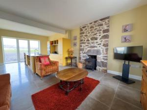 Posezení v ubytování 4 Bedroom Cottage New 2024