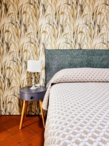 A bed or beds in a room at Villa Selva