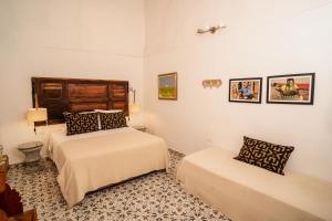 Postel nebo postele na pokoji v ubytování Casa Al Alma + 37 fotografií