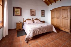 Postel nebo postele na pokoji v ubytování Casas Rurales Los Almendreros