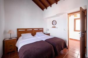 Posteľ alebo postele v izbe v ubytovaní Casa Rural Los Perales