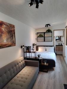 Postel nebo postele na pokoji v ubytování Zen huisje
