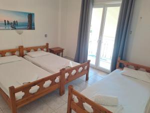 Postel nebo postele na pokoji v ubytování Golden Beach Sea View