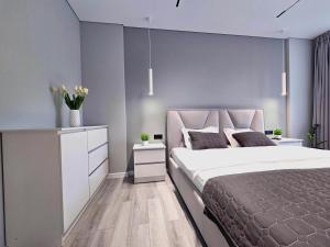 Postel nebo postele na pokoji v ubytování Dream on Sichovykh
