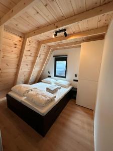 Voodi või voodid majutusasutuse E d e l h e r t - Luxe Alpenhuis in prachtig Karinthië toas