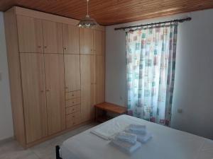Postel nebo postele na pokoji v ubytování ΕΙΡΗΝΗ Studios