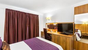 TV a/nebo společenská místnost v ubytování Magnuson Hotel Sandy Lodge Newquay + 37 fotografií