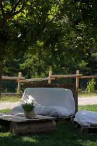 a couple of beds sitting in the grass at StarsBox a Casa Colēt in Frabosa Sottana