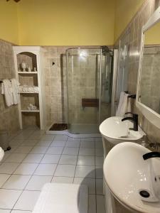 A bathroom at Seabliss Villa