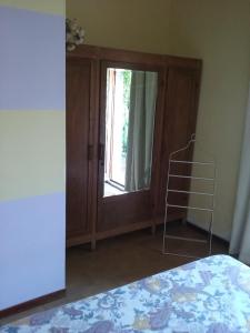 Postel nebo postele na pokoji v ubytování Casa Virgilio