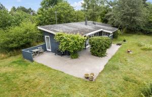 an aerial view of a house with a patio at 2 Bedroom Cozy Home In Nykøbing Sj in Nykøbing Sjælland +9 photos