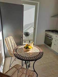 Cuisine ou kitchenette dans l'établissement Tanger, Vue Mer Panoramique