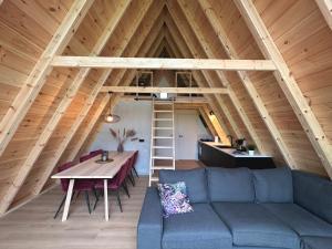 Istumisnurk majutusasutuses E d e l h e r t - Luxe Alpenhuis in prachtig Karinthië