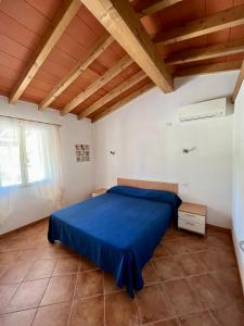 Postel nebo postele na pokoji v ubytování Casa Campanella Resort