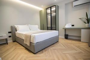 Postel nebo postele na pokoji v ubytování Mina Luxury Rooms