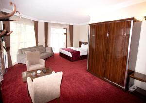 Postel nebo postele na pokoji v ubytování Resmina Hotel + 34 fotografií