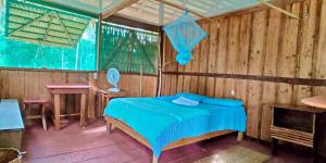 Postel nebo postele na pokoji v ubytování Amazonas Life Camp