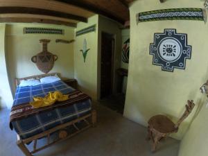 Postel nebo postele na pokoji v ubytování Salkantay Hostel Chaullay