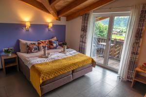 Postel nebo postele na pokoji v ubytování Haus Piesendorf