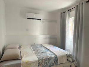 Eilat Beach House客房内的一张或多张床位