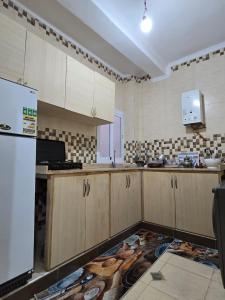 Kuchyň nebo kuchyňský kout v ubytování Appartement à louer wadie