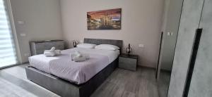 Postel nebo postele na pokoji v ubytování Casa Aria