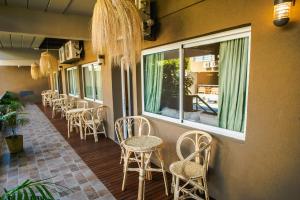 Uru Apart Iguazu餐厅或其他用餐的地方