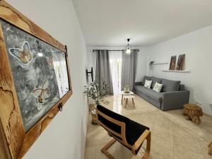 a living room with a couch and a chair at Vista Montemar in San Miguel de Abona +38 photos