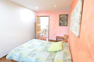 Voodi või voodid majutusasutuse Aparthotel Los Pinos toas
