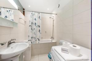 Vannituba majutusasutuses Melide Apartments - Happy Rentals