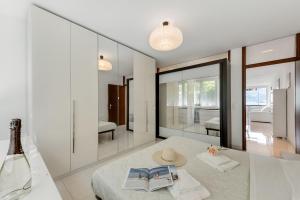 Voodi või voodid majutusasutuse Melide Apartments - Happy Rentals toas