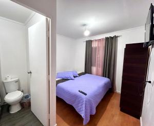 Ένα ή περισσότερα κρεβάτια σε δωμάτιο στο Hostal la Plaza