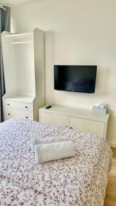 Ένα ή περισσότερα κρεβάτια σε δωμάτιο στο Super studio Paris La Défense