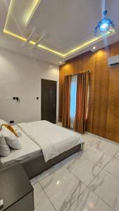 Ένα ή περισσότερα κρεβάτια σε δωμάτιο στο Sapphire Residences by Crystal