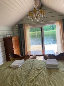 Postel nebo postele na pokoji v ubytování Kung Solsta