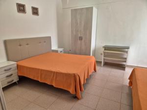 Postel nebo postele na pokoji v ubytování Appartamenti in Centro a Vieste