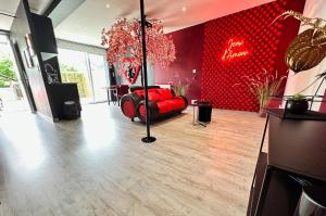 Posedenie v ubytovaní Suite Jeux d’Amour Jacuzzi / Love Room