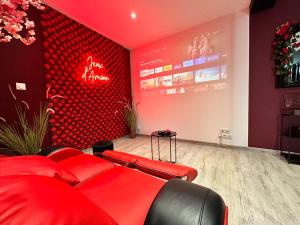Posedenie v ubytovaní Suite Jeux d’Amour Jacuzzi / Love Room