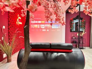 Posedenie v ubytovaní Suite Jeux d’Amour Jacuzzi / Love Room