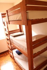 Nuhh Hostel客房内的一张或多张床位