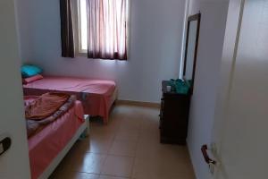 Postel nebo postele na pokoji v ubytování Top House Hostel Sharm El Sheikh + 7 fotografií