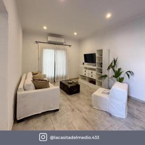 TV a/nebo společenská místnost v ubytování La Casita del Medio
